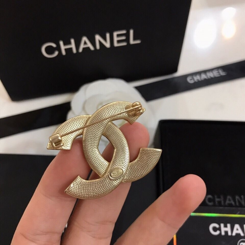 Ch**el brooches